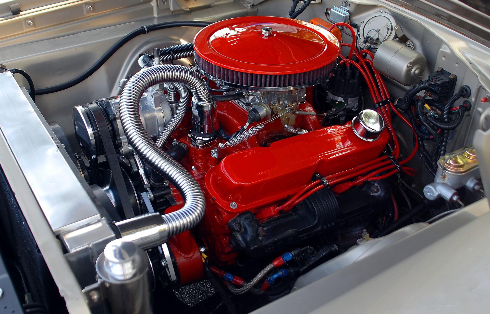 A red and silver car engine