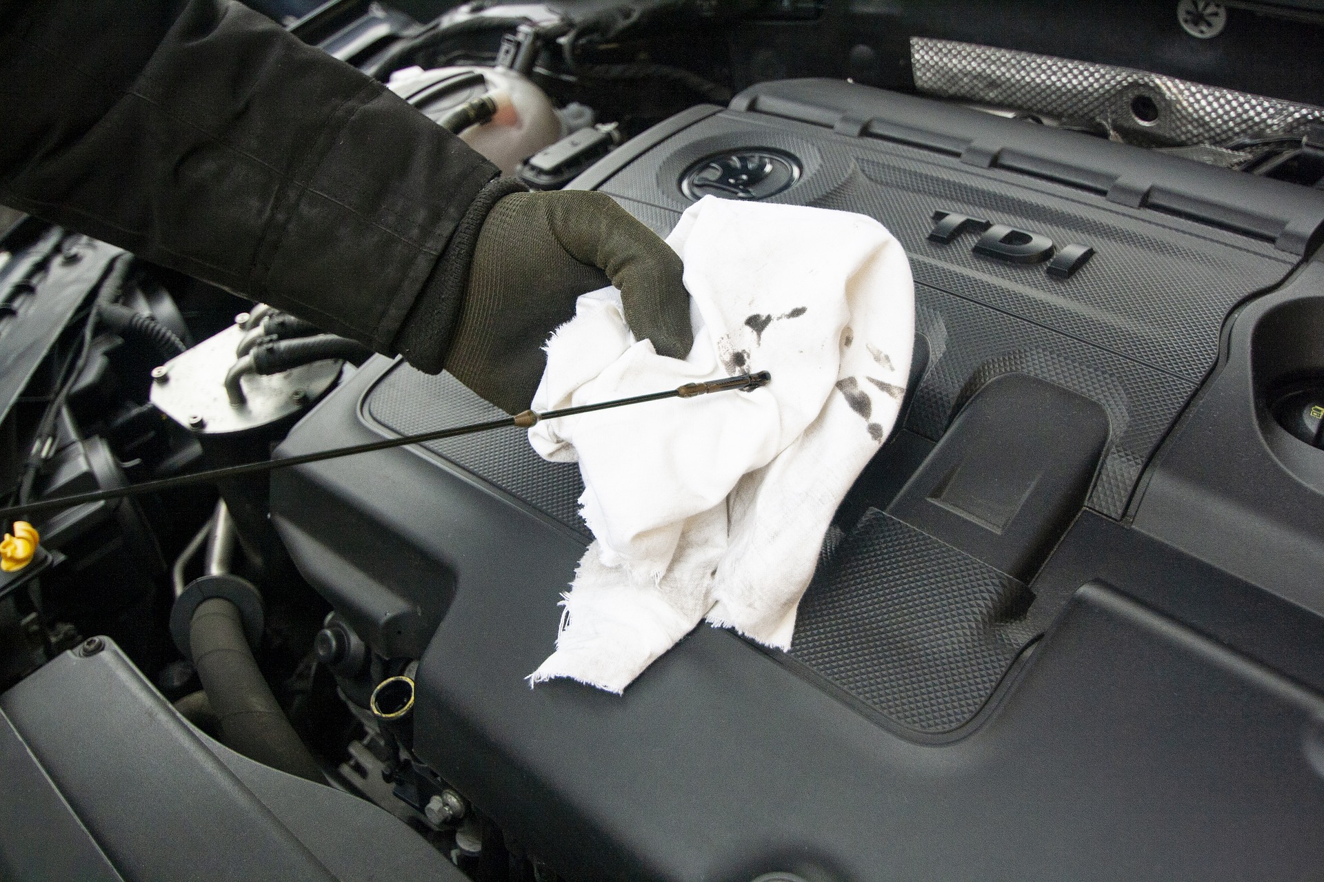 A mechanic working on a car