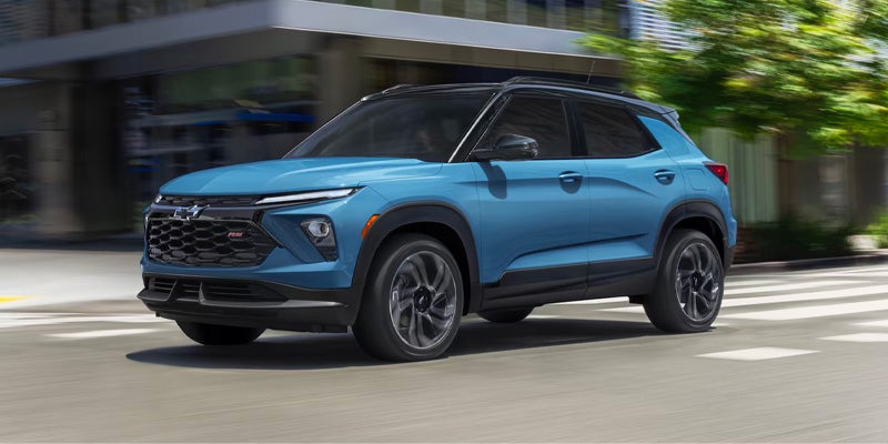 Chevrolet Trailblazer SUV driving through city street in blue color